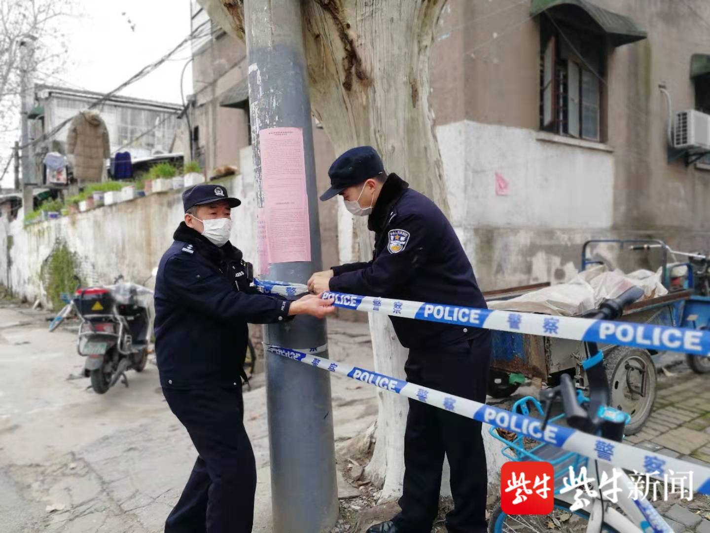 田恩为中和桥北村封闭管理拉设警戒线.
