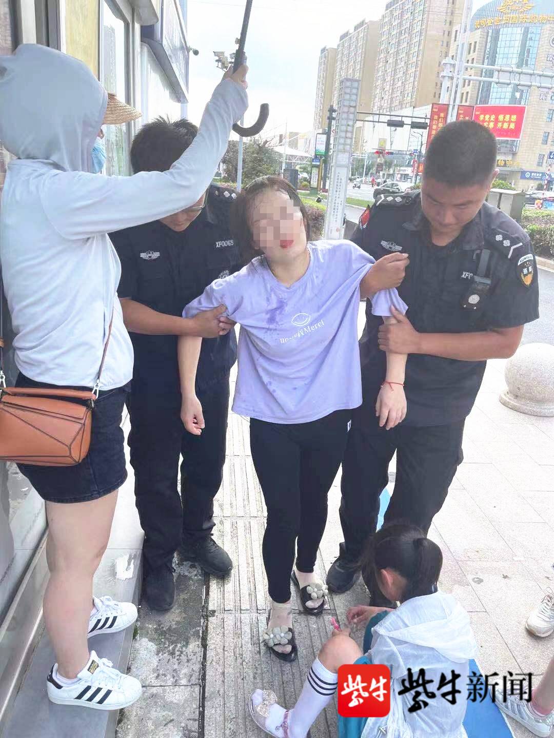 晕倒女子得到及时救助